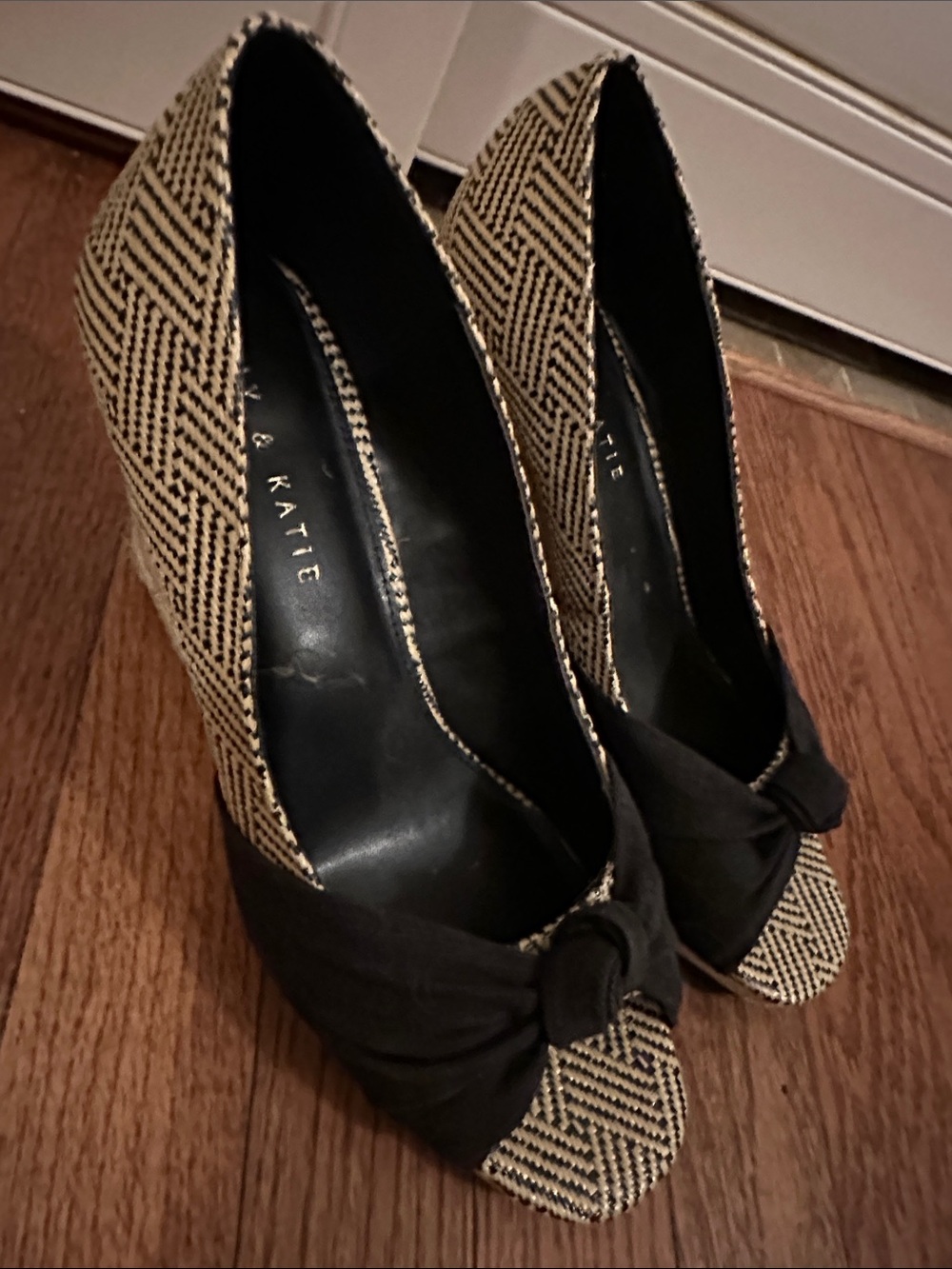 Kelly & Katie Black and Beige Woven Peep-Toe Knot Wedges
